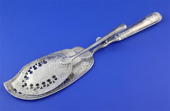 A pair of mid 19th century Russian 84 zolotnik silver fish serving tongs, with sprung auxiliary blade, gross 5 oz.